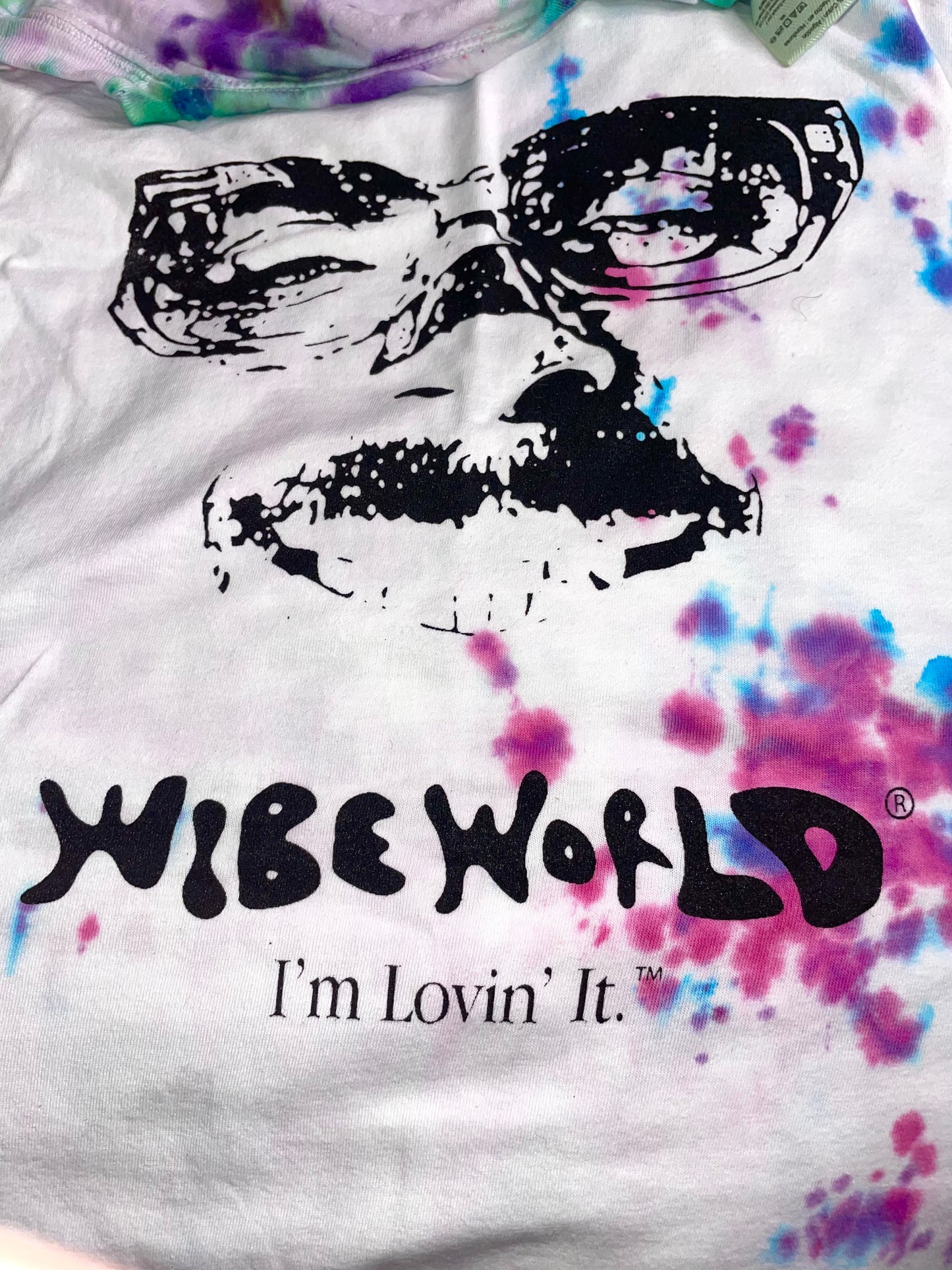A SPECIAL HAND TIE-DYED wibe world "IM LOVIN IT" shirt